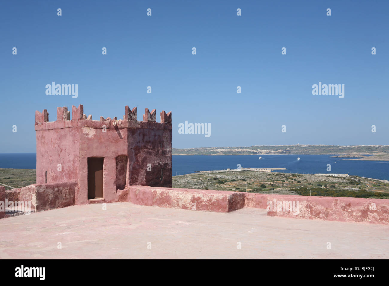 The Red tower on Marfa Ridge near Cirkewwa on Malta  - the island  in the Mediterranean Stock Photo