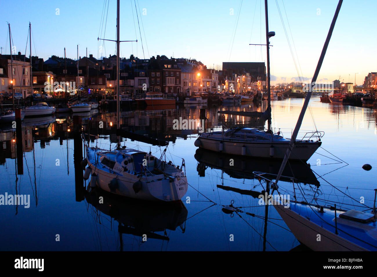 weymouth old harbour dusk into night,