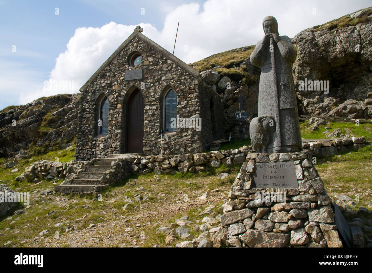 Statue of Saint Patrick, and the Chapel, Maumeen Pass, Maumturk Mountains, Connemara, County Galway, Ireland Stock Photo