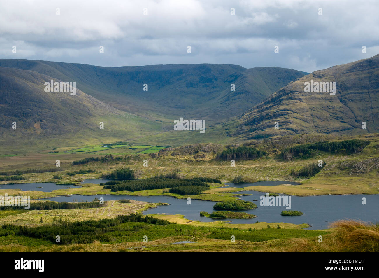 The Maumtrasna plateau in the Partry Mountains, over Lough Tawnyard, from the Sheeffry Hills, County Mayo, Ireland Stock Photo