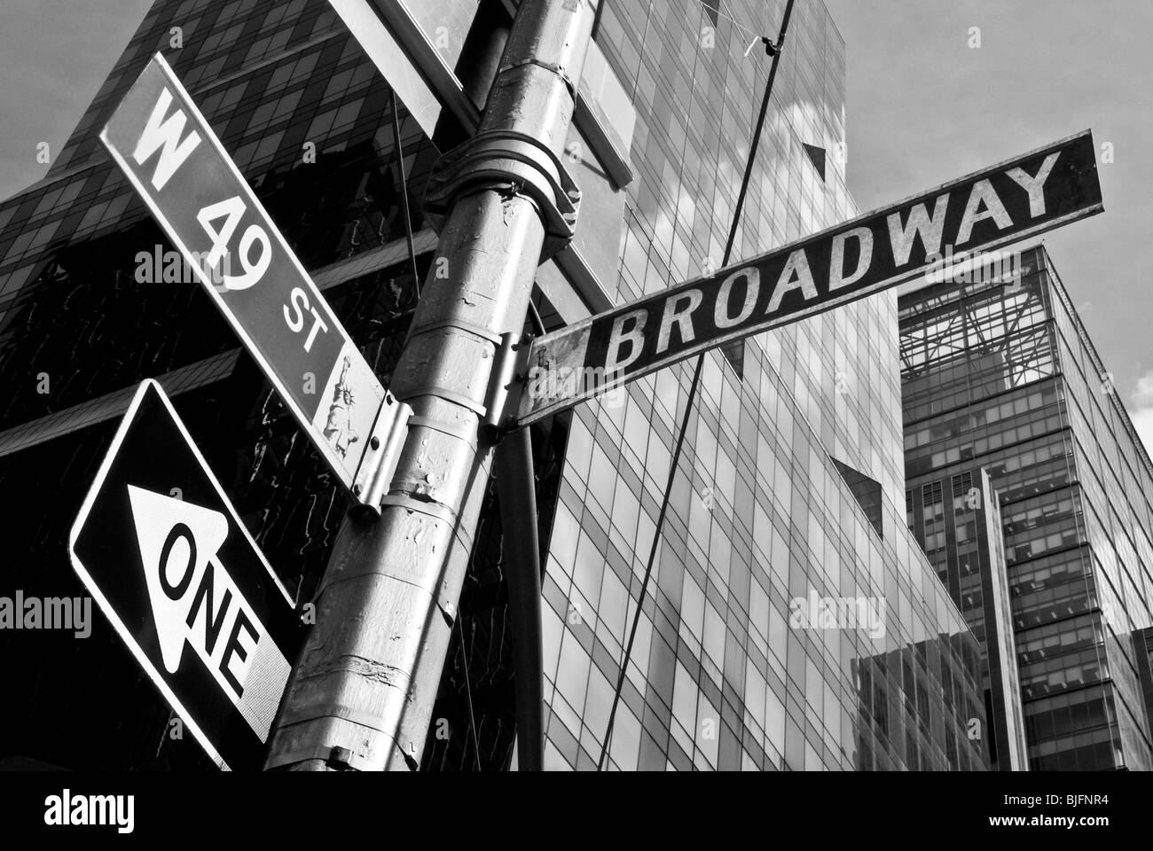 Black and white study of Broadway and W49th St Signpost in New York City - September 2009 Stock Photo