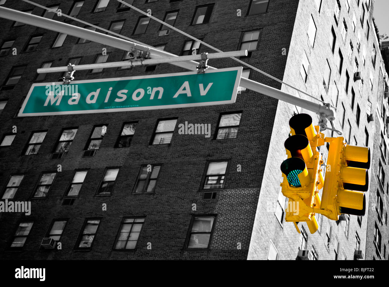 Madison Avenue Street Sign and Traffic Light in Spot Colours -Manhattan - New York City - USA Stock Photo