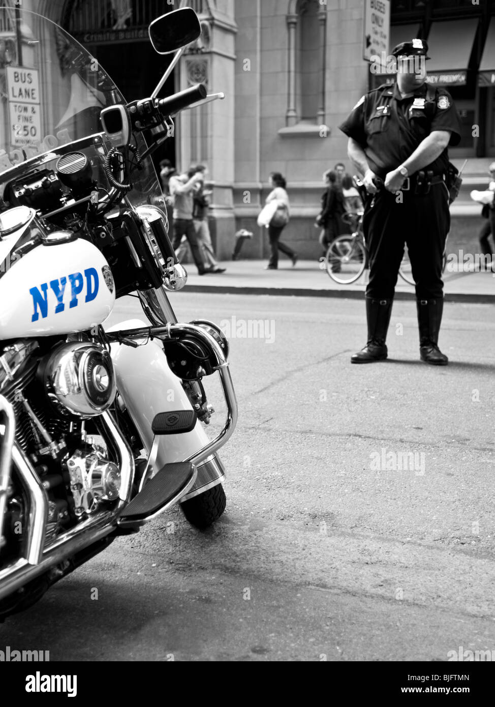 NYPD Blue. Traffic Officer and his bike in NYC Stock Photo