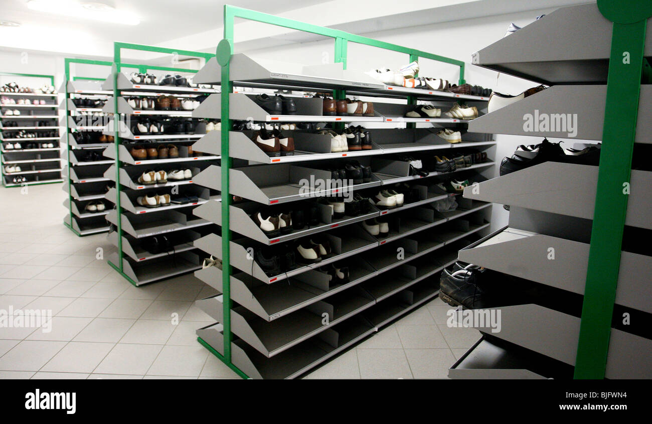 Racks of golf shoes Stock Photo Alamy