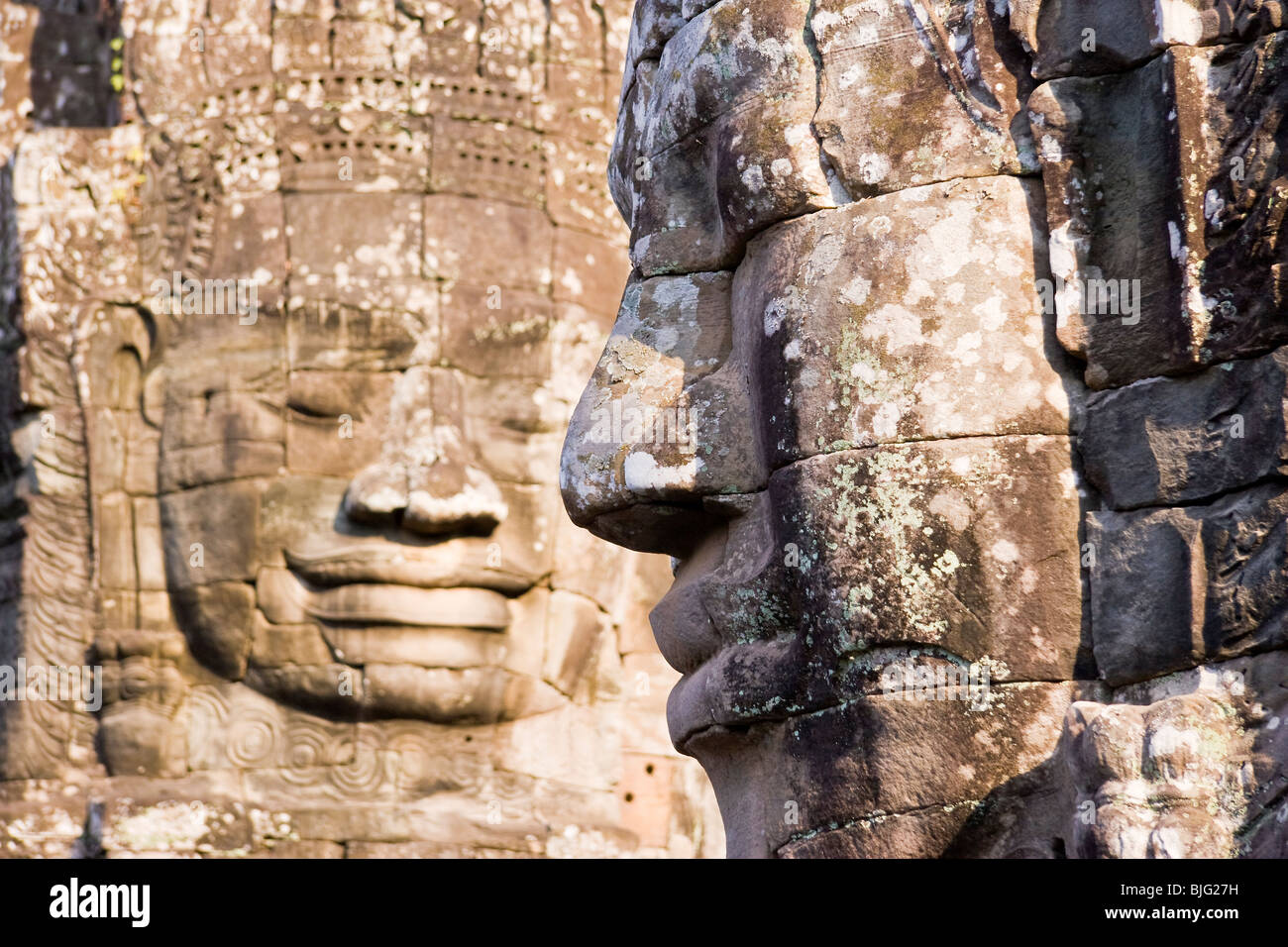 Two Enigmatic Face Towers forming part of The Bayon, Angkor Thom, Temples of Angkor, Cambodia, Indochina Stock Photo