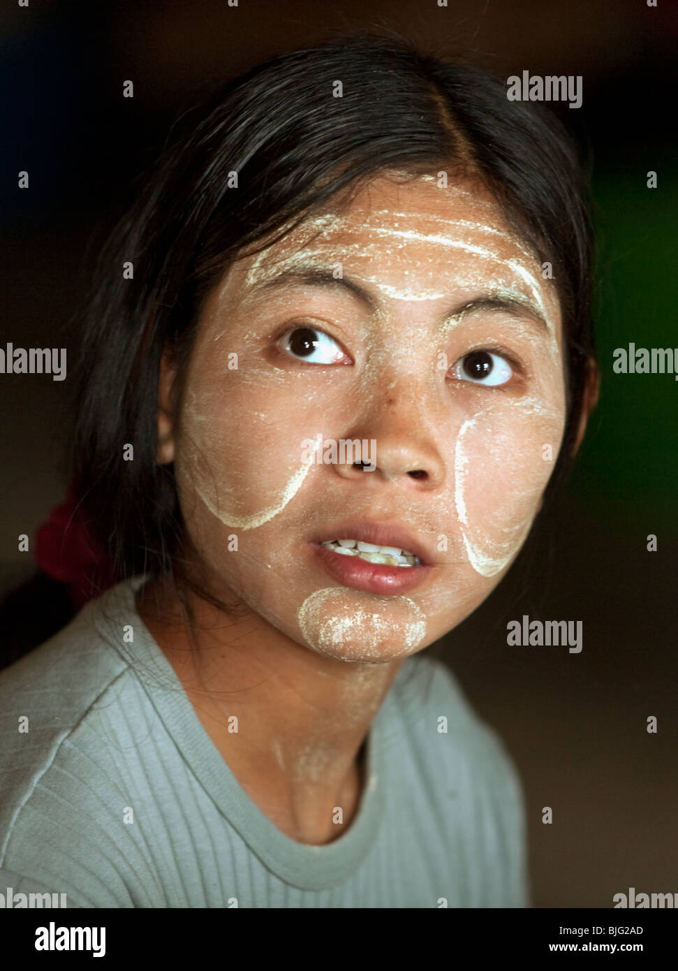 Myanmar sea-gypsies, the nomadic hunter-gatherers of South East Asia.  Beautiful woman wearing traditional face paint Stock Photo