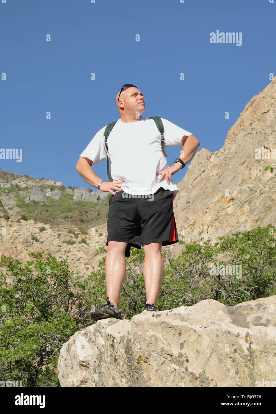 Male hiker on rock hi-res stock photography and images - Alamy