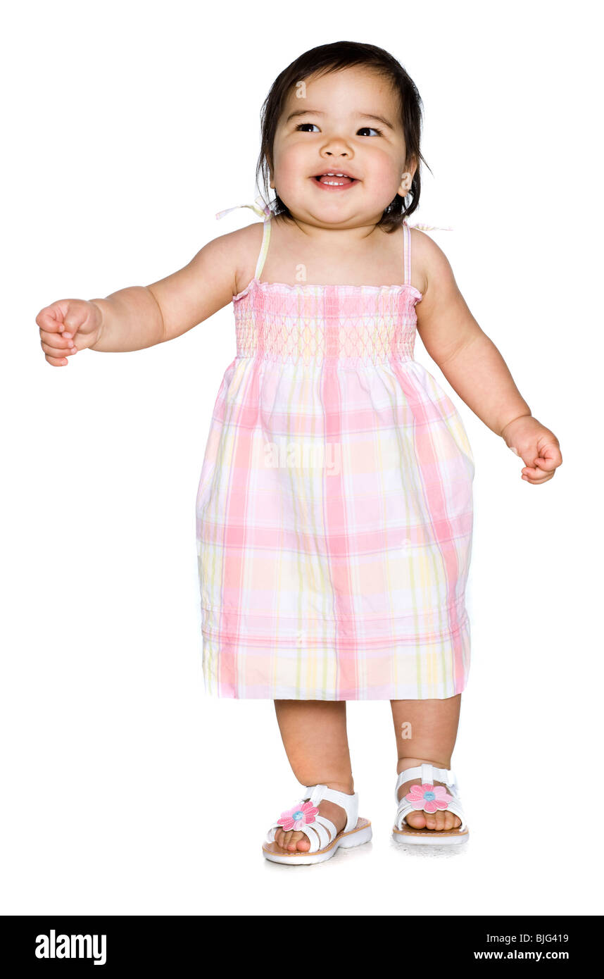 baby girl in a pink dress Stock Photo - Alamy