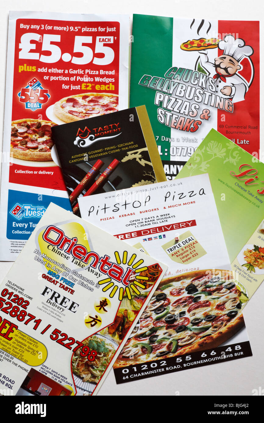 assortment of Junk mail unsolicited mail for fast food offers takeaways Stock Photo