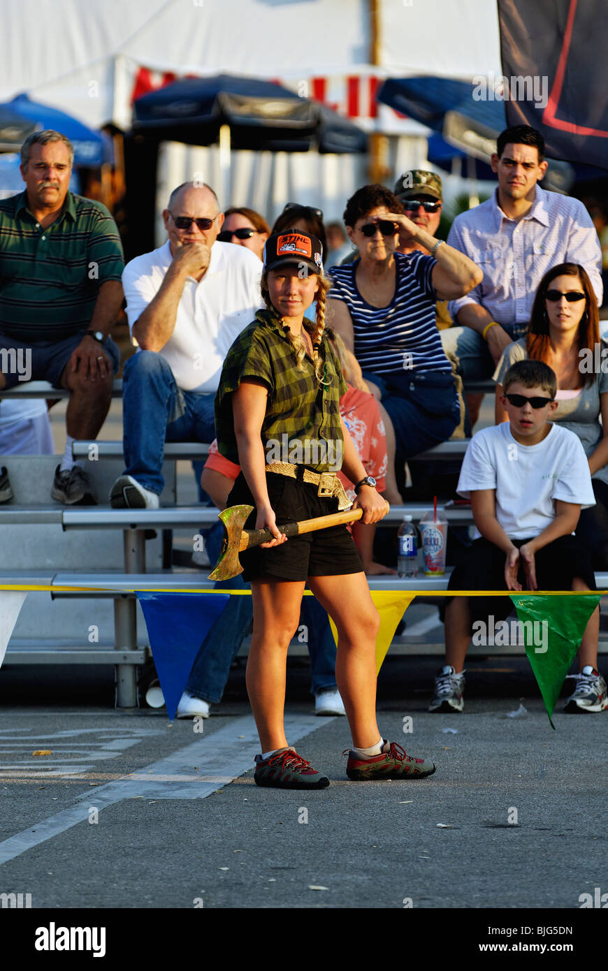 Female Lumberjack Standing with Double Bladed Axe in Demonstration at the 2009 Kentucky State Fair in Louisville, Kentucky Stock Photo
