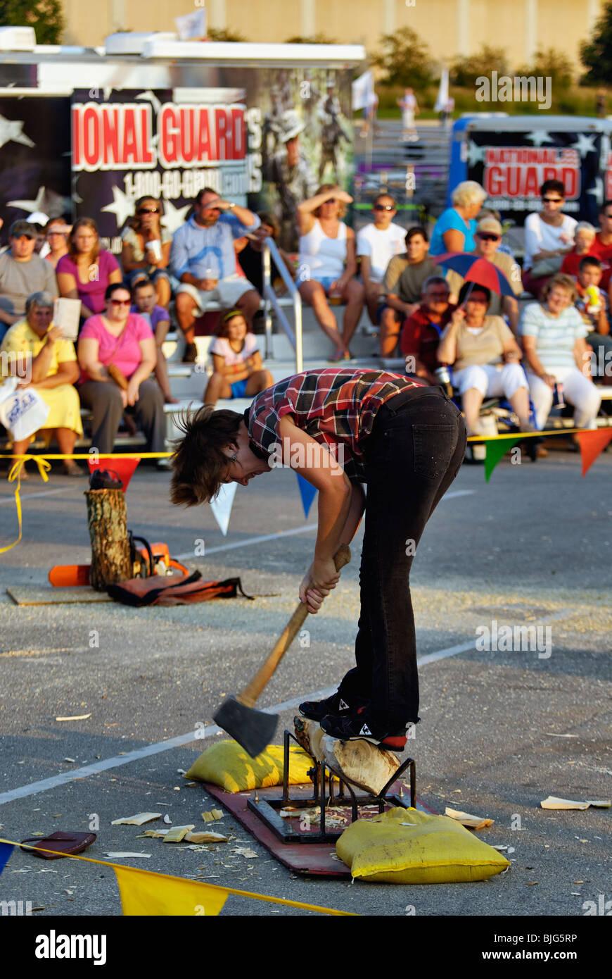 Female Lumberjack Demonstrating the use of an Axe at the 2009 Kentucky State Fair in Louisville, Kentucky Stock Photo