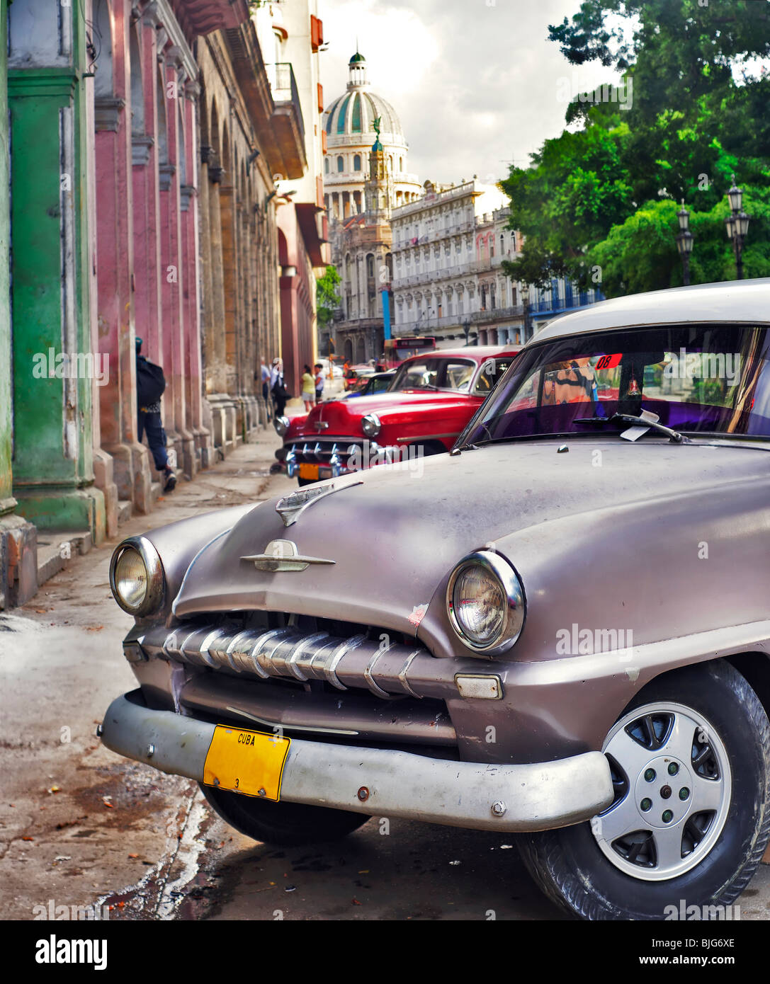 Detail of classic american car with havana buildings in the background Stock Photo