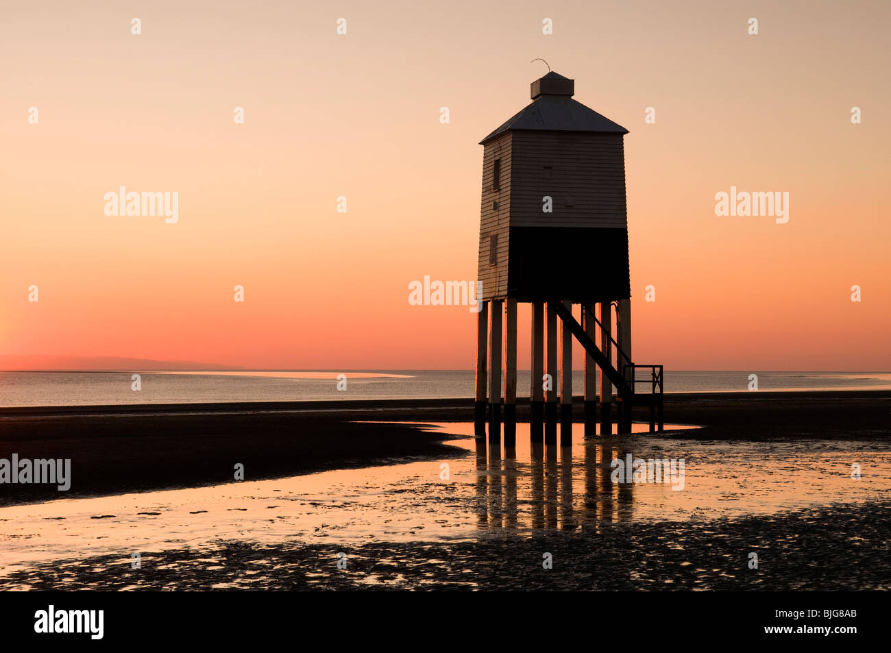 The Low Lighthouse, lighthouse on legs, at sunset on Burnham on Sea beach in Somerset, UK Stock Photo
