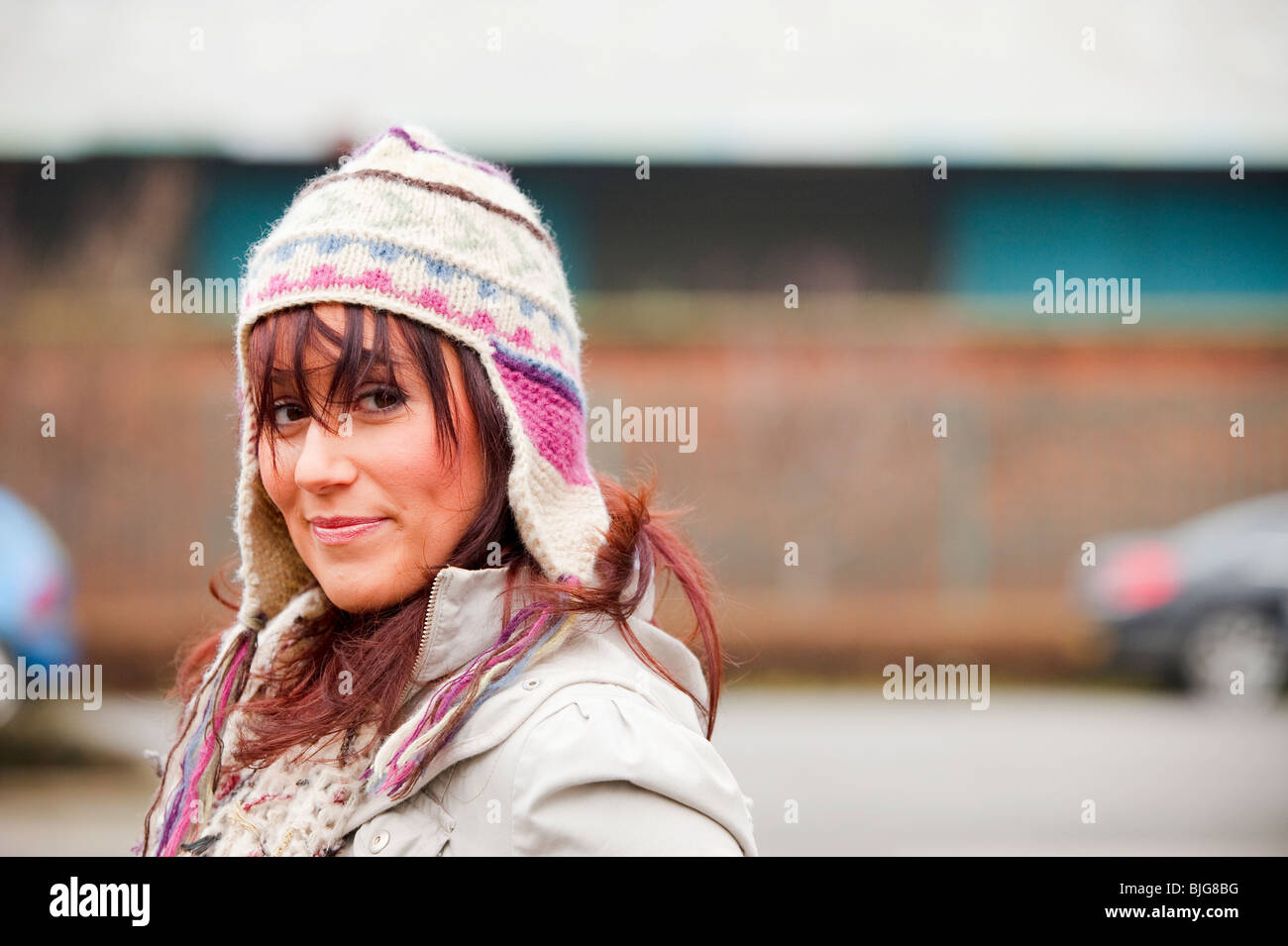 Young 20 something woman smiling wearing hat. FULLY MODEL RELEASED Stock Photo
