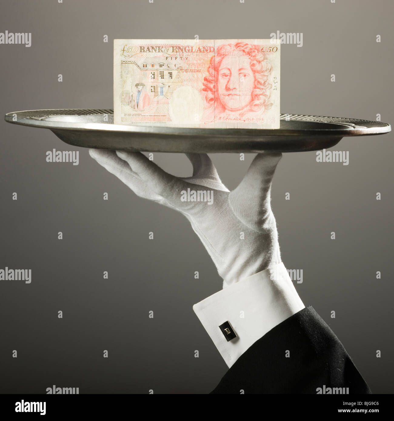british pound on a platter Stock Photo