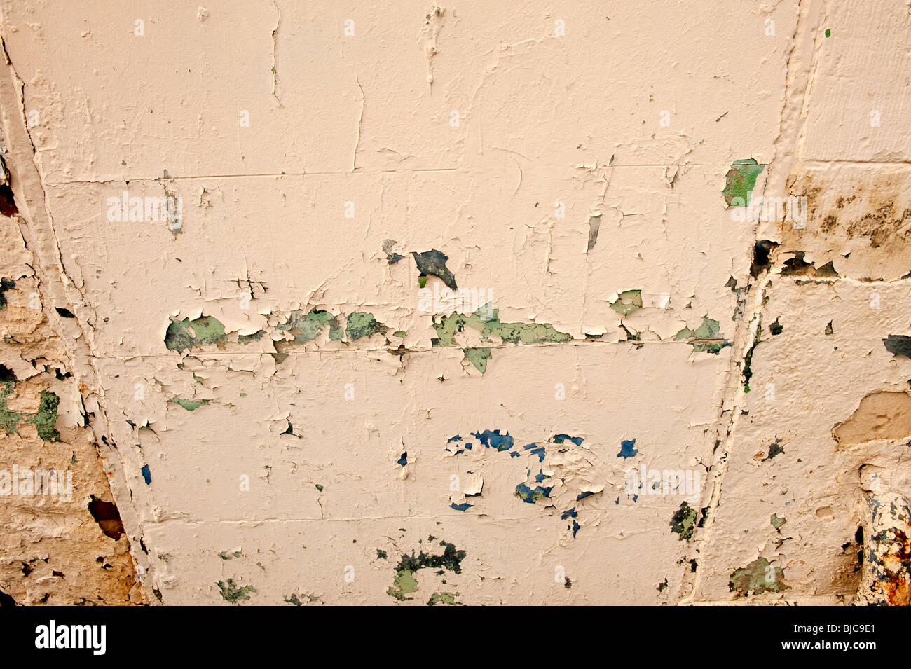 Old flaking layers of paint on stone wall Stock Photo Alamy