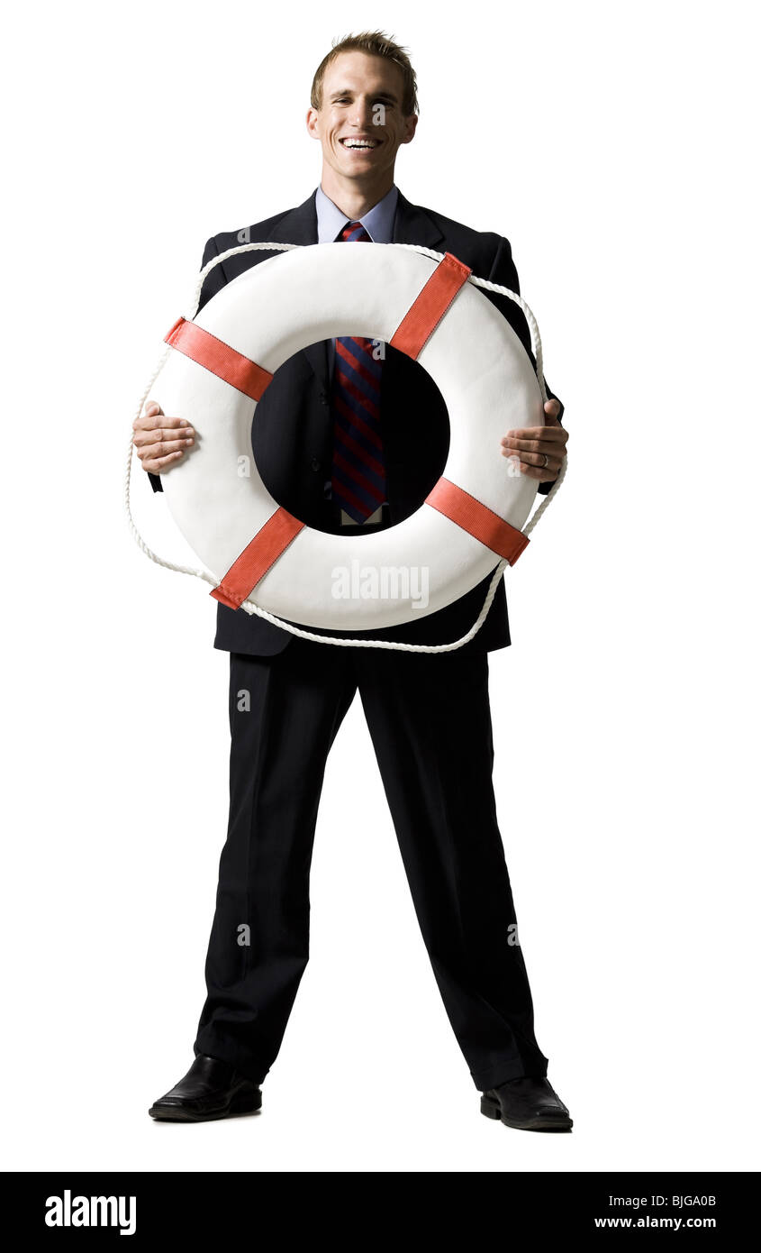 businessman holding a life preserver Stock Photo - Alamy