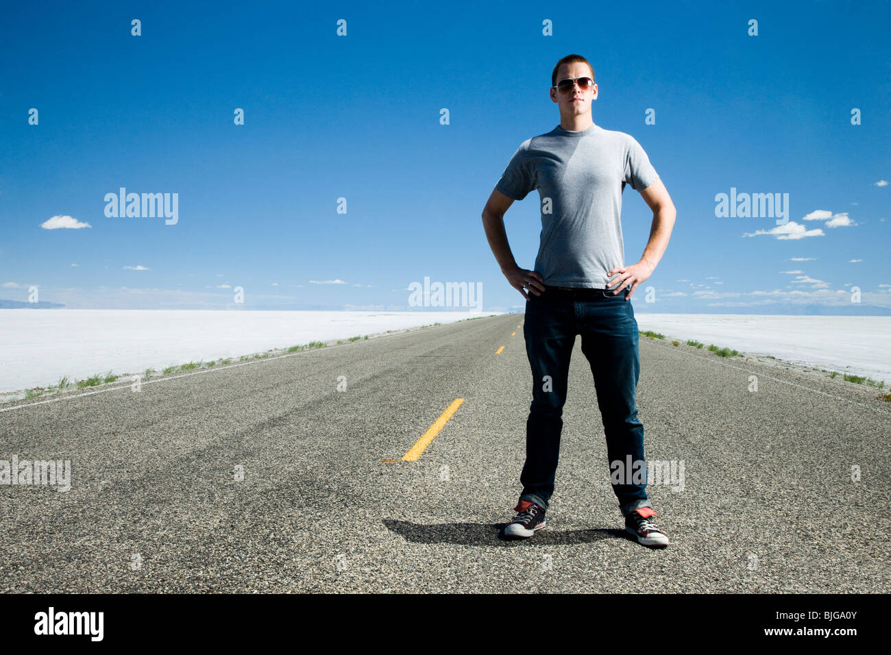 man on a road in the middle of nowhere Stock Photo Alamy