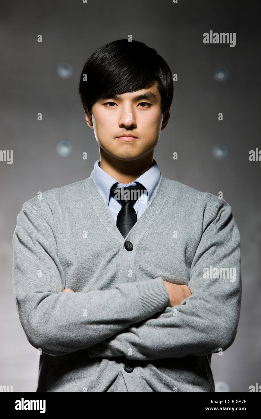 Man dressed in business casual with a serious face Stock Photo