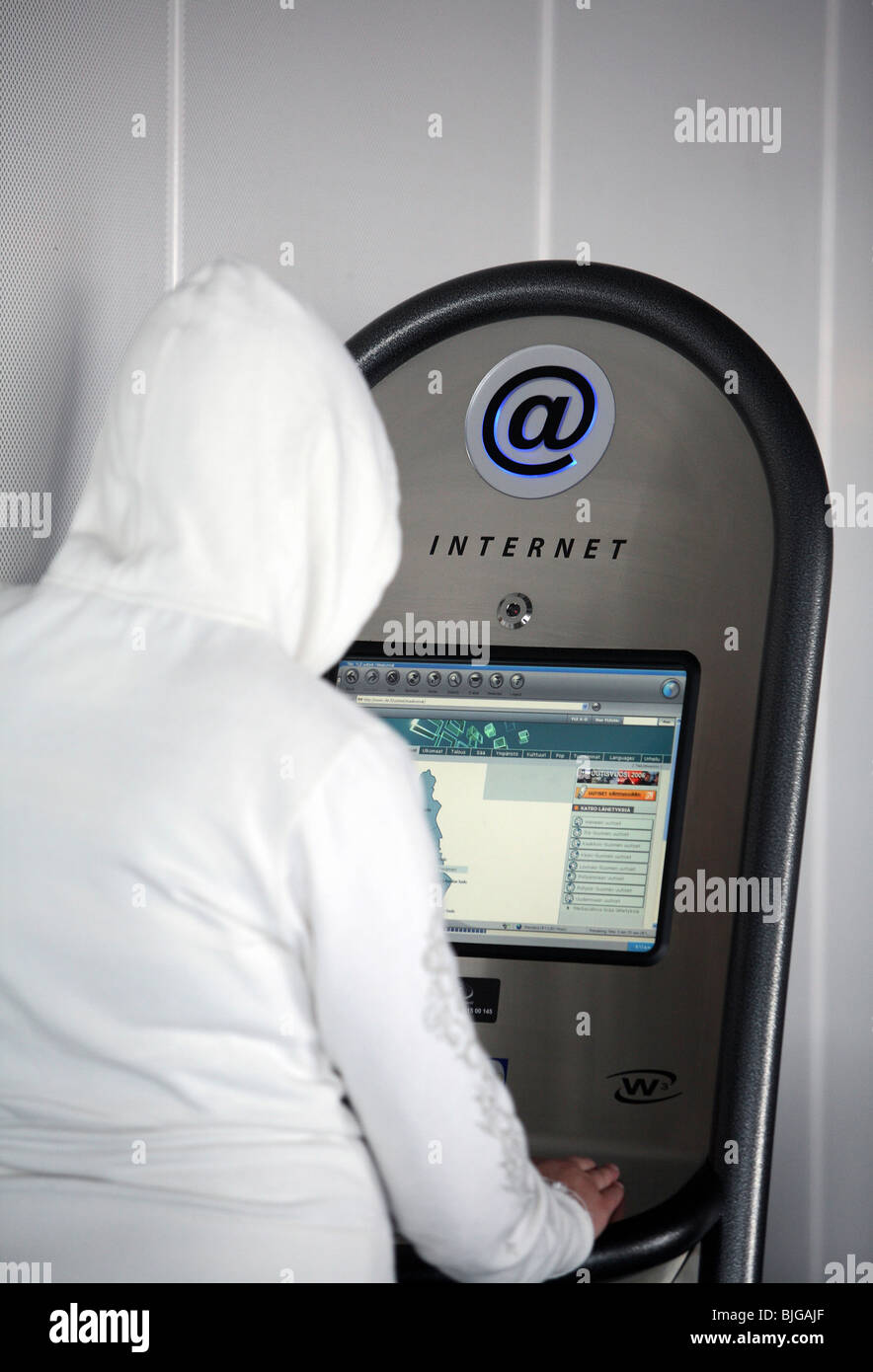 Person using an Internet terminal, Frankfurt, Germany Stock Photo