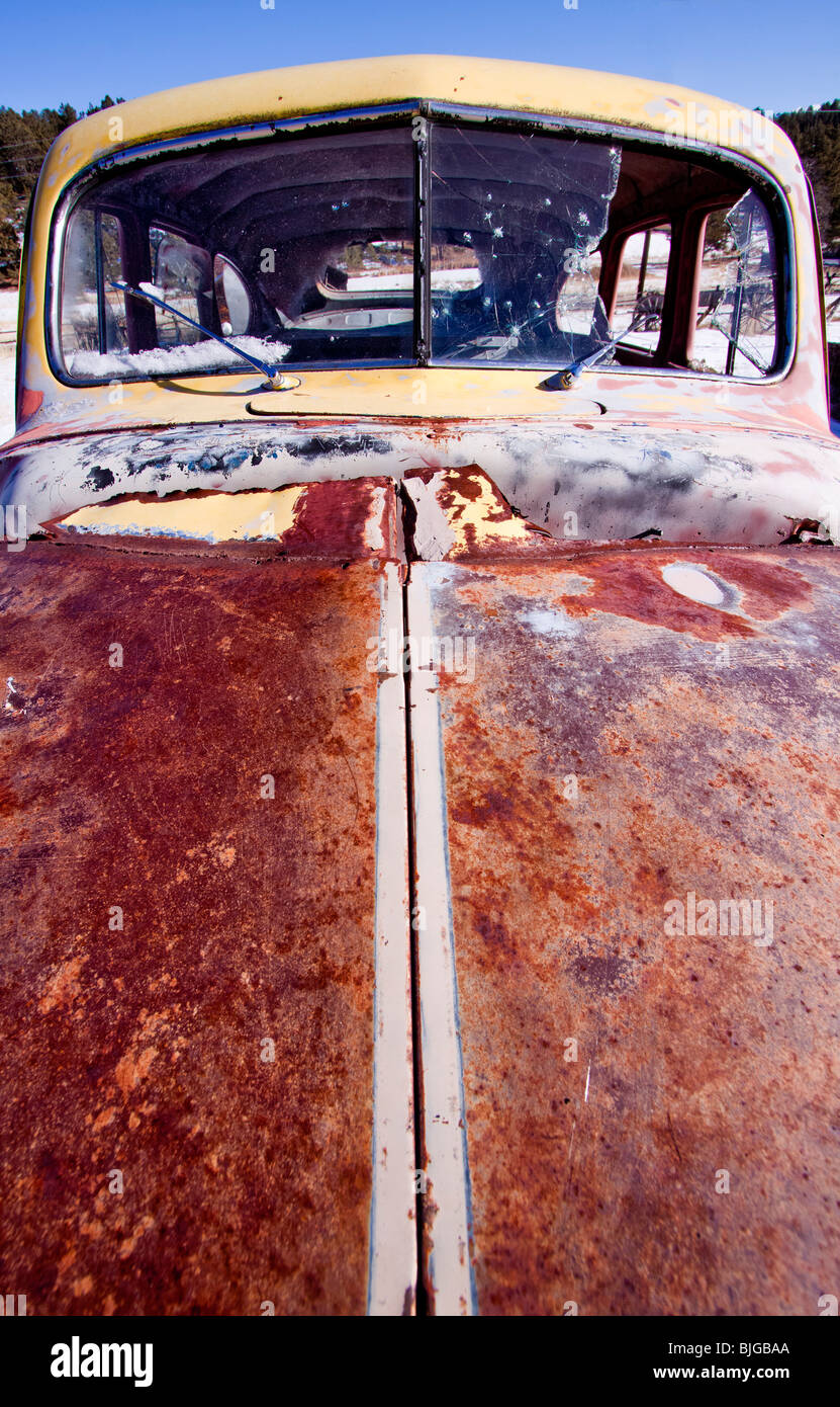 A rusted out vintage antique car in Guffey, Colorado, USA. Stock Photo