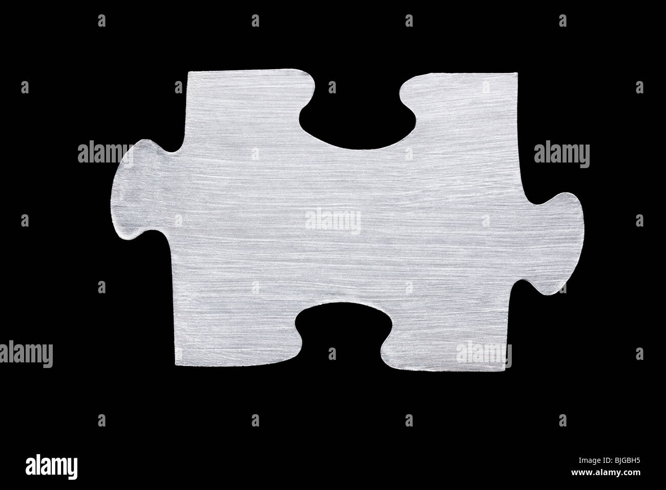 metallic puzzle piece Stock Photo