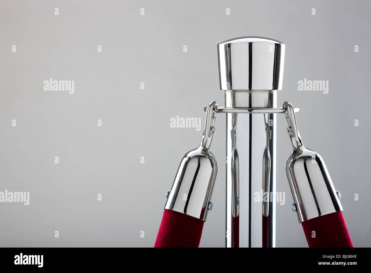 rope stand with a velvet rope attached Stock Photo