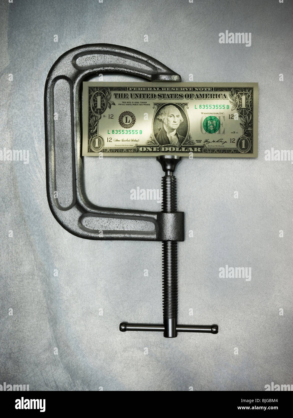 money in a clamp Stock Photo Alamy