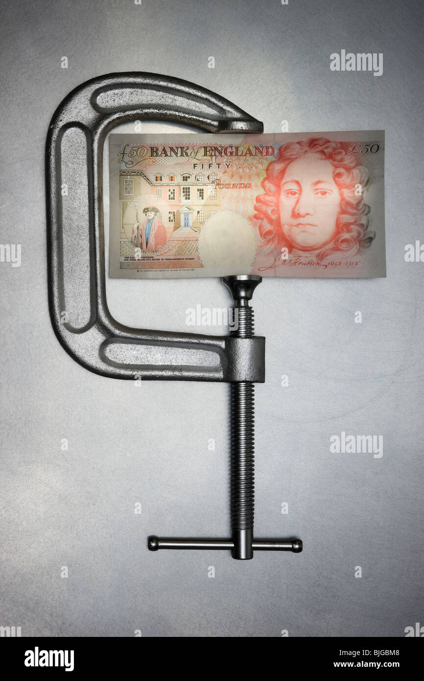 money in a clamp Stock Photo Alamy