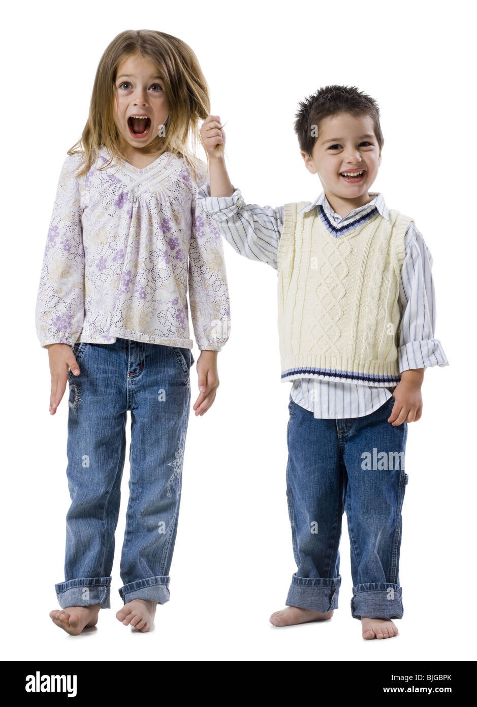 Brother Pulling His Sister s Hair Stock Photo Alamy