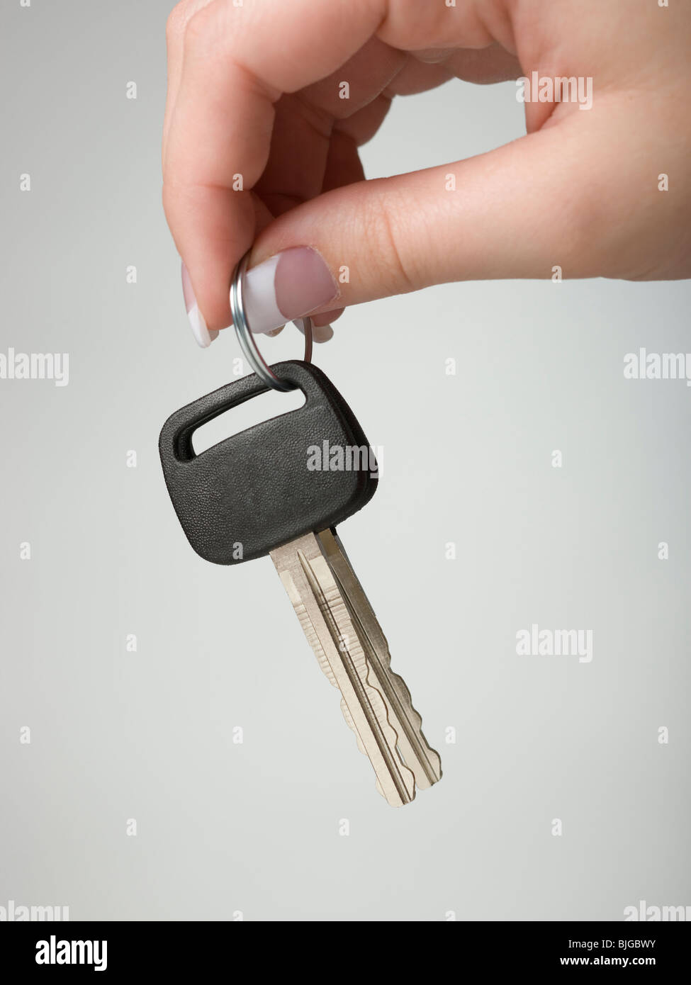 Hand holding keys Stock Photo