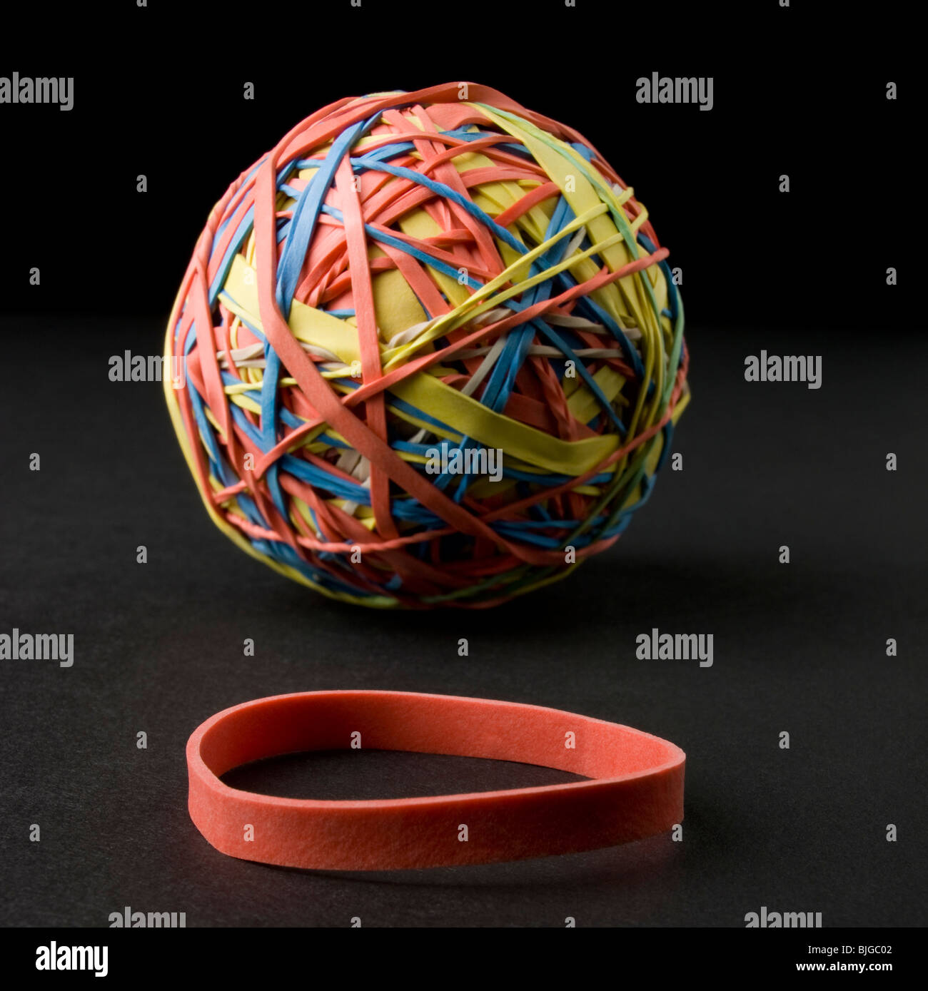 rubber band and a rubber band ball Stock Photo