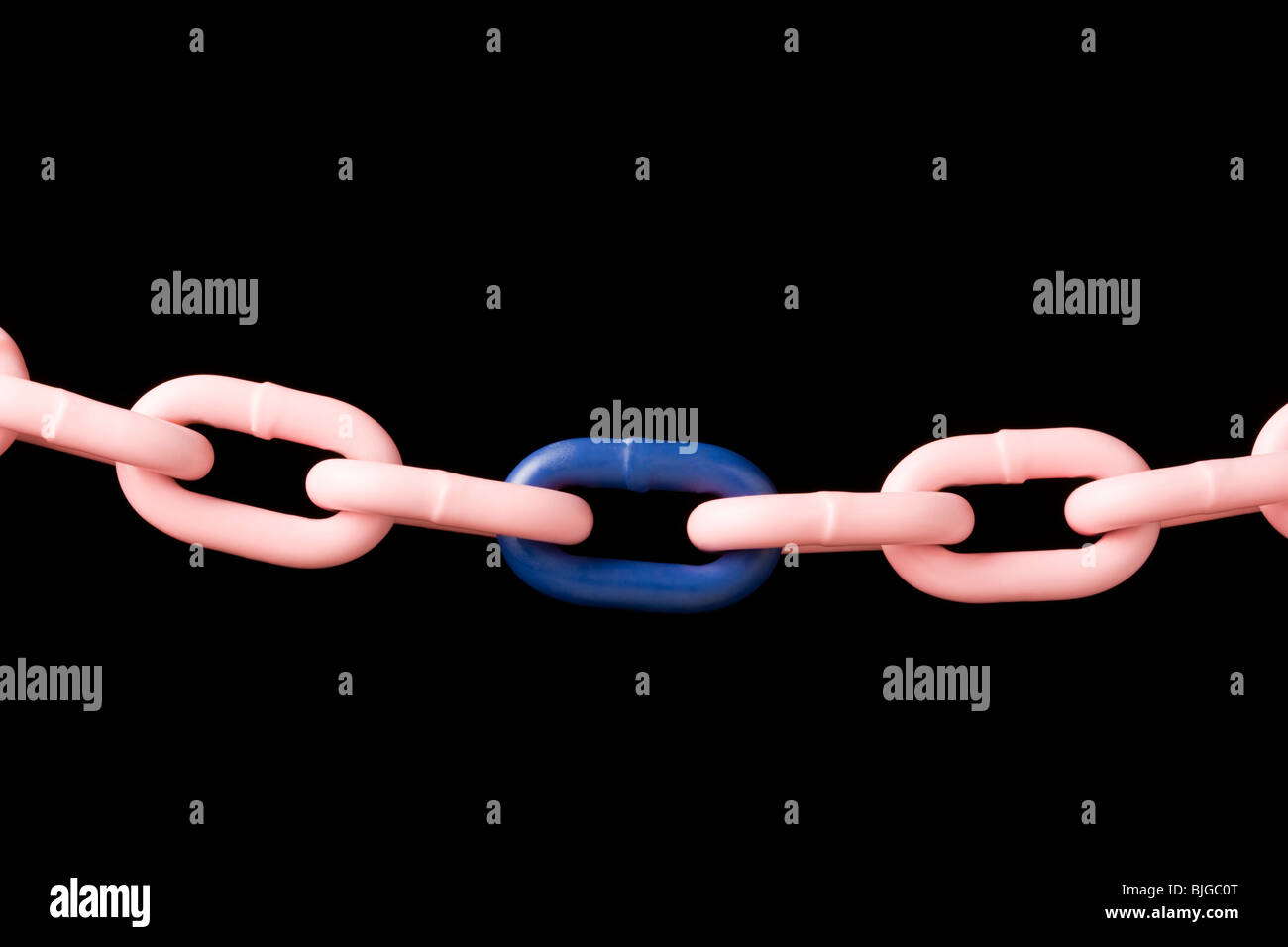 blue link in a pink chain Stock Photo