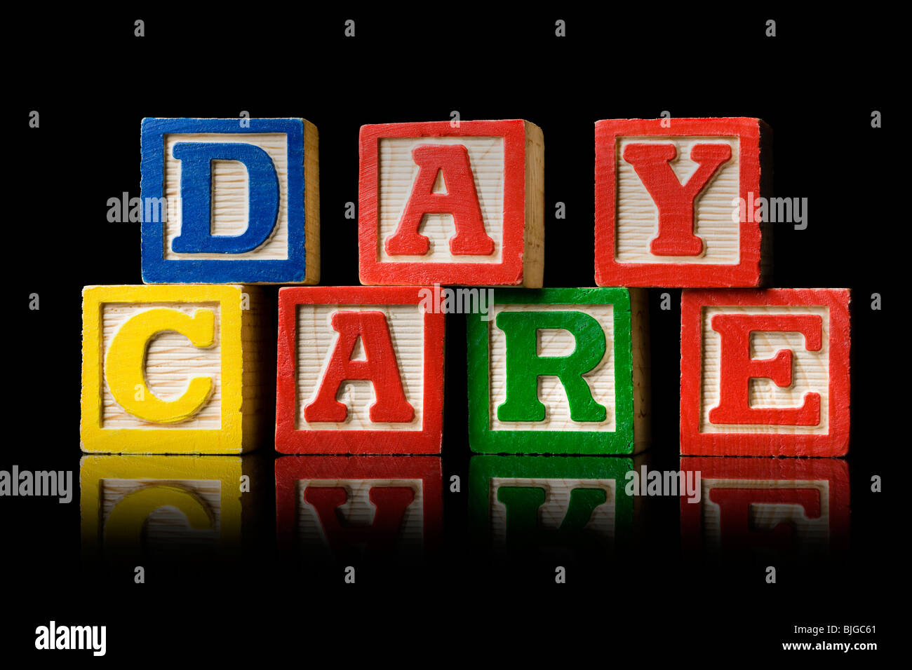 nursery blocks spelling 'day care' Stock Photo