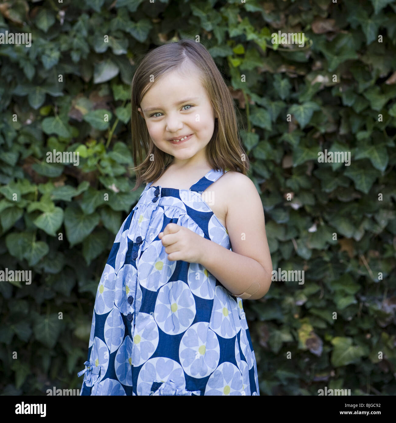little girl in a blue dress Stock Photo - Alamy