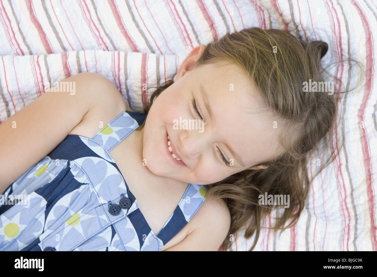 little girl in a blue dress Stock Photo - Alamy