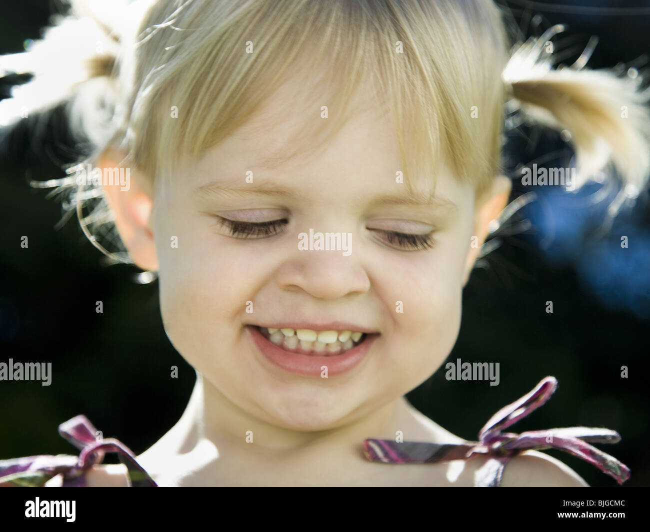 little girl with pigtails Stock Photo - Alamy