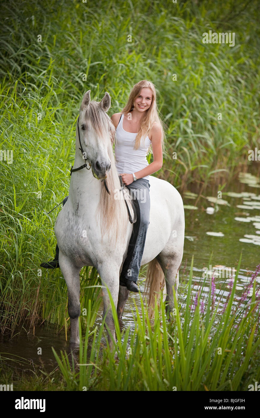 Young Woman On Pure Spanish bred Horse Stock Photo Alamy young-woman-on-pure-spanish-bred-horse-stock-photo-alamy