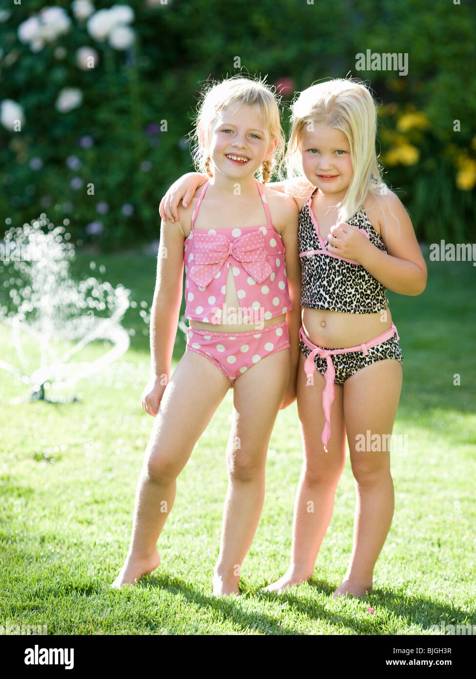 Little Girls In Swimsuits High Resolution Stock Photography and Images -  Alamy