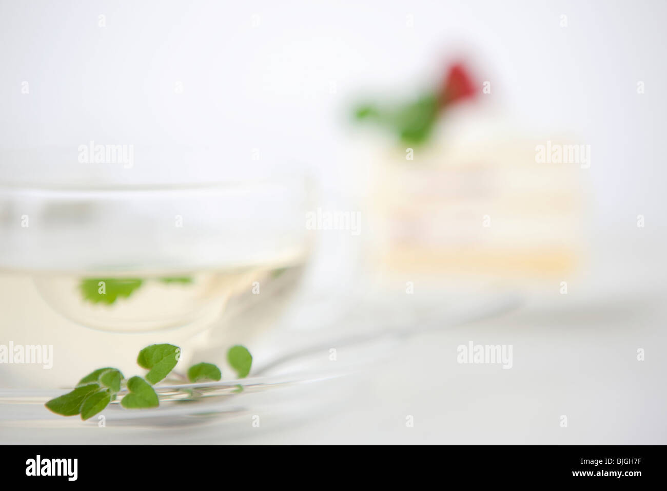 Herbal tea with cake in the background Stock Photo Alamy