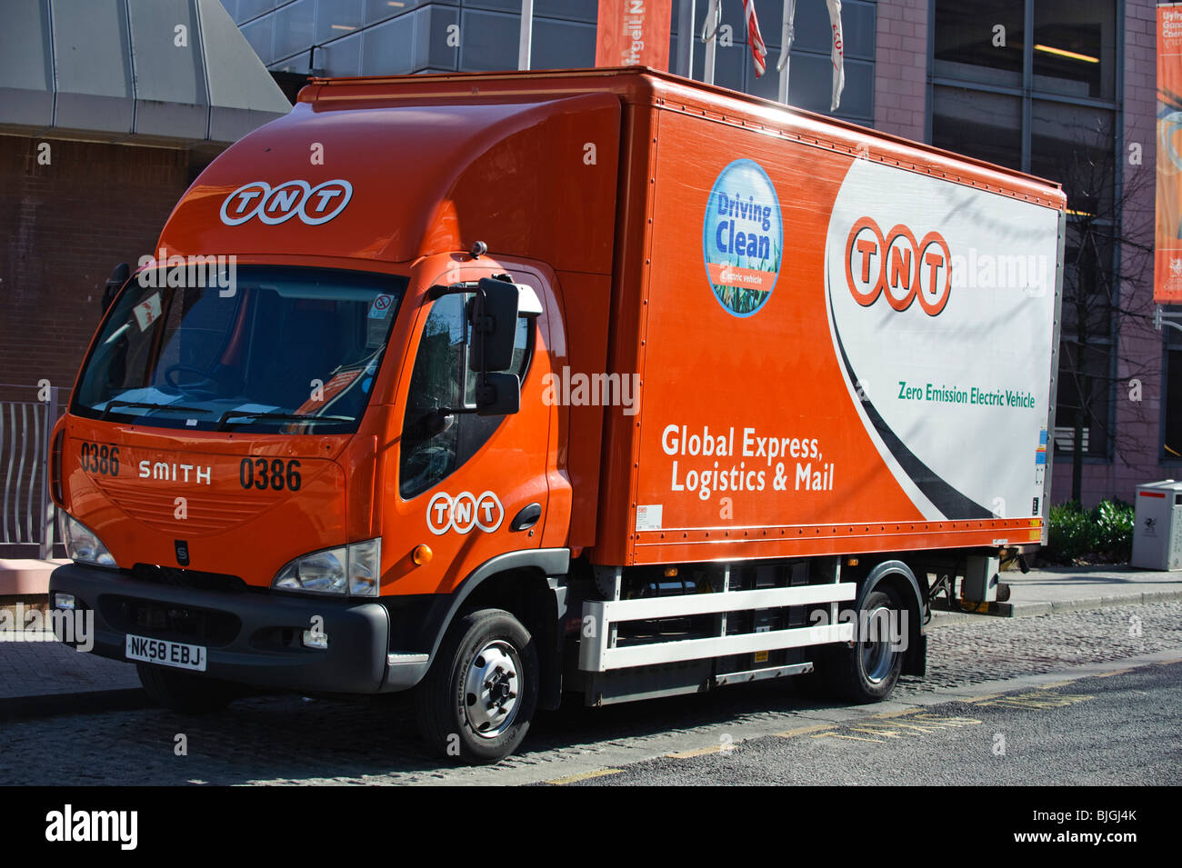 TNT Express Logistics Zero Emissions Electric powered delivery truck lorry in Cardiff Wales UK Stock Photo