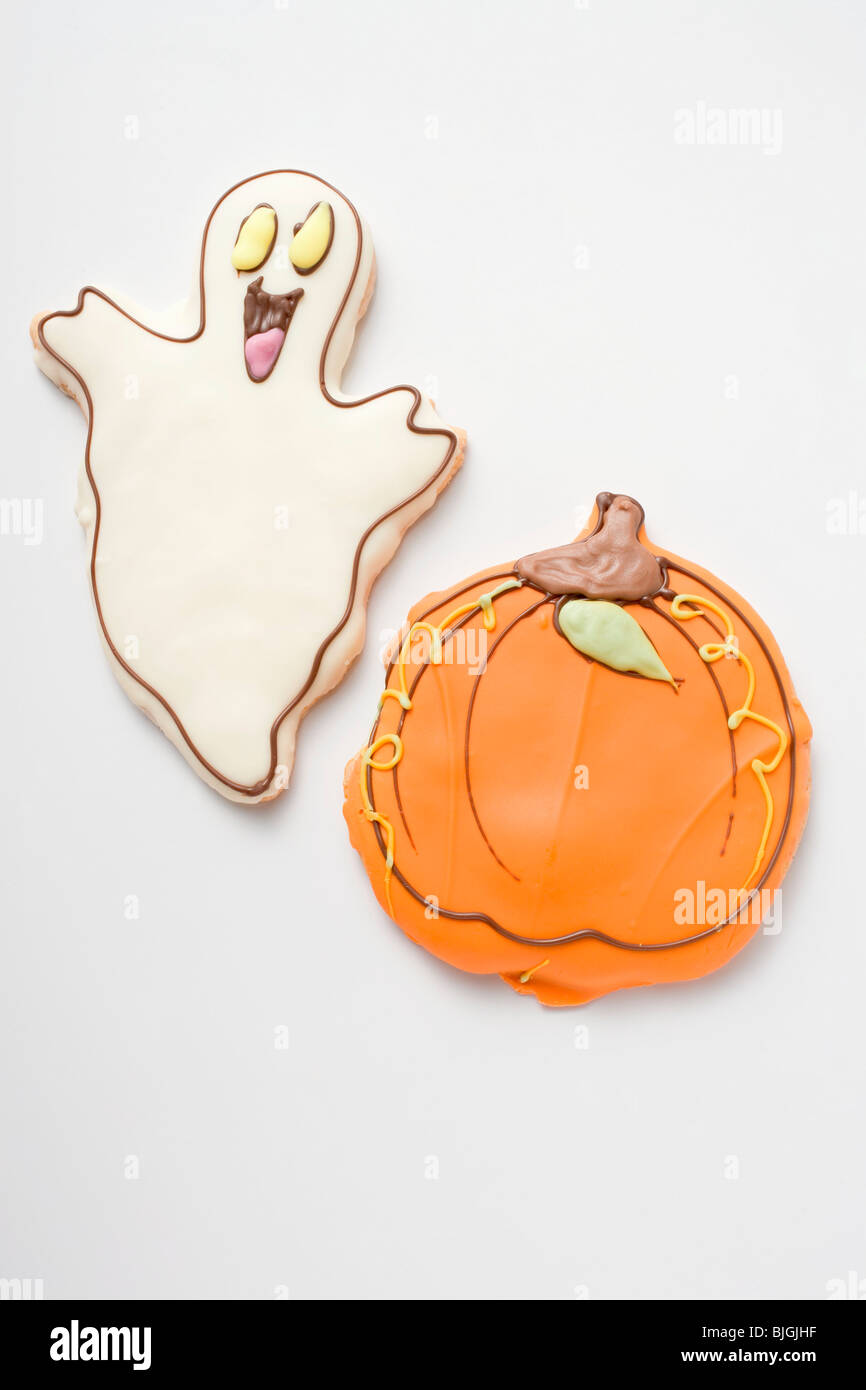 Two Halloween biscuits (ghost, pumpkin) - Stock Photo