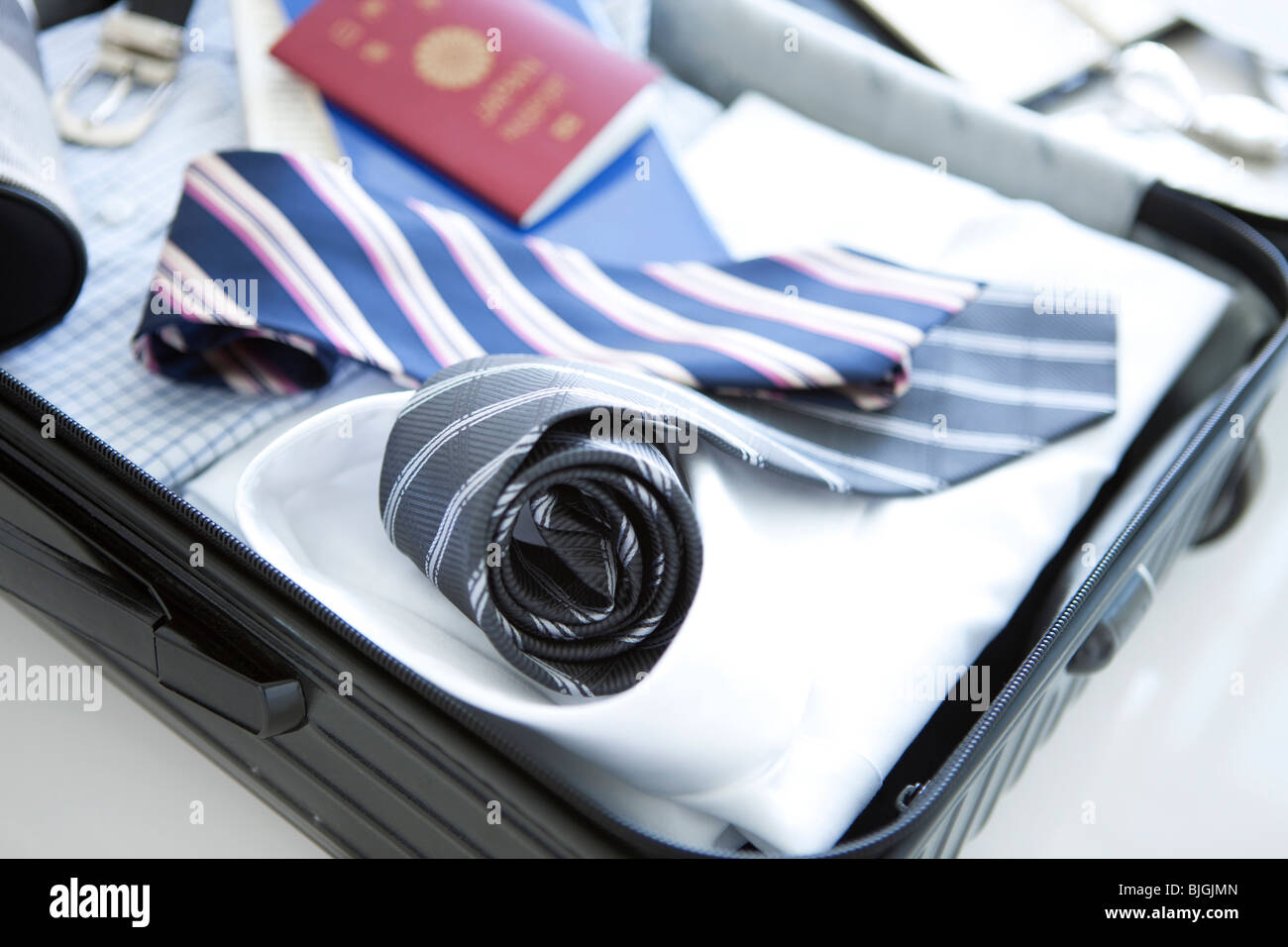 Packed suitcase lying open Stock Photo
