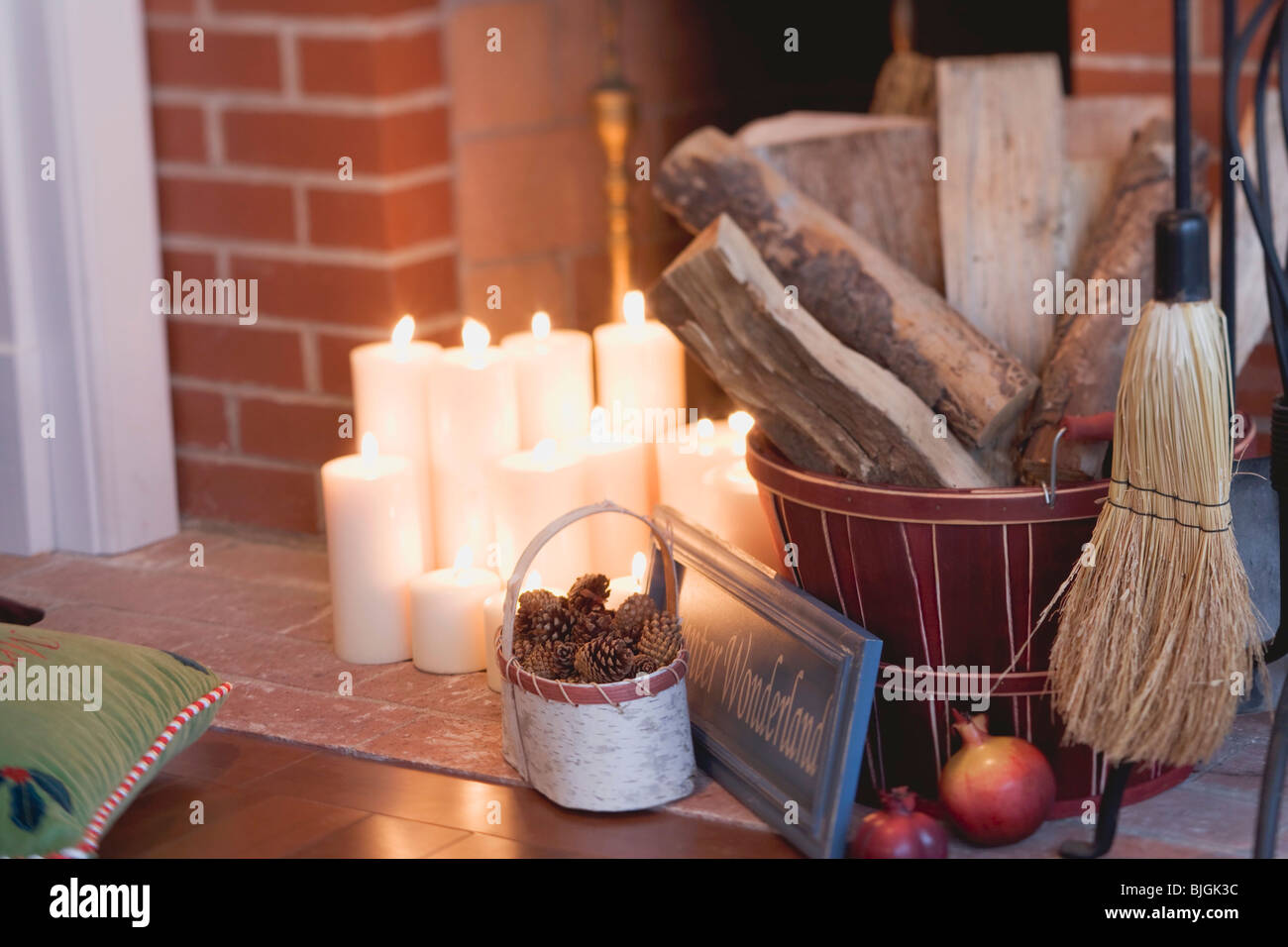 Christmas decorations in front of fireplace Stock Photo Alamy