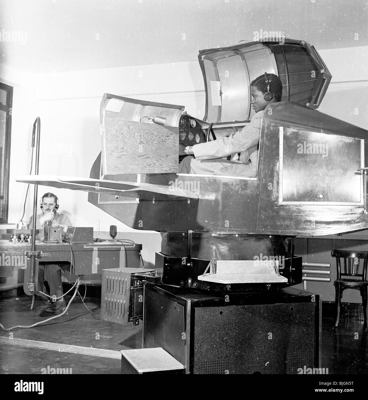 Flight training in 1950s. Pilot learning to fly a plane in an aircraft ...