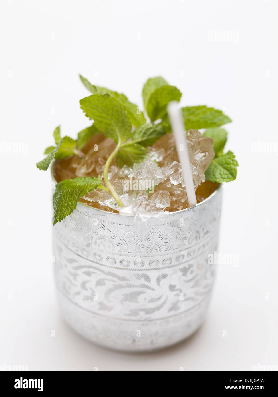Cold peppermint tea in silver beaker - Stock Photo