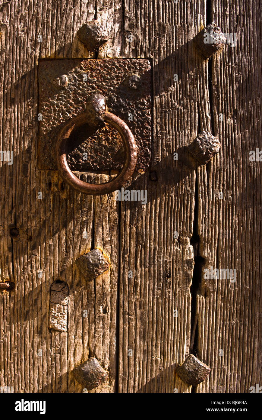Very old wooden door on village lock up Stock Photo