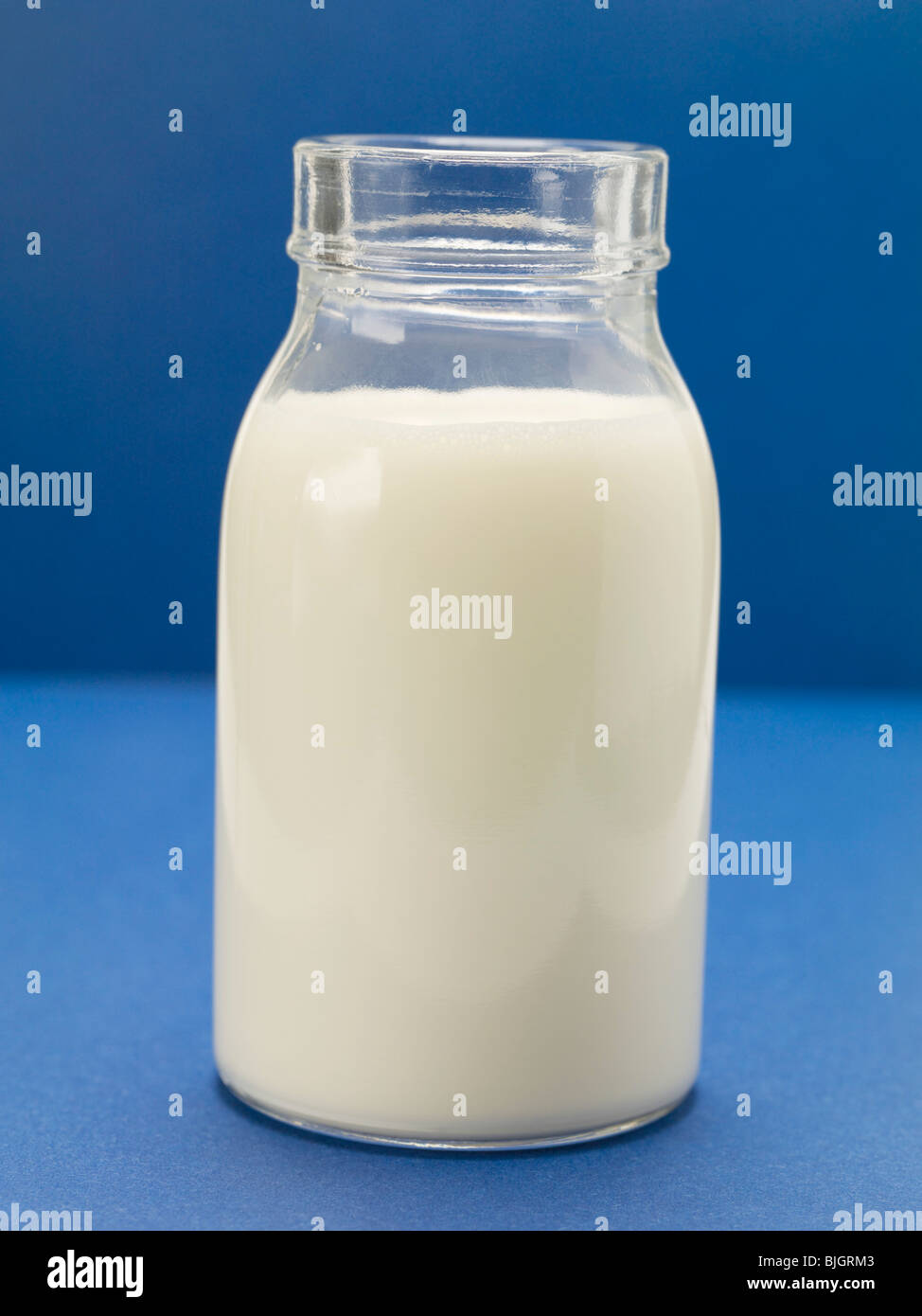 Small bottle of milk - Stock Photo
