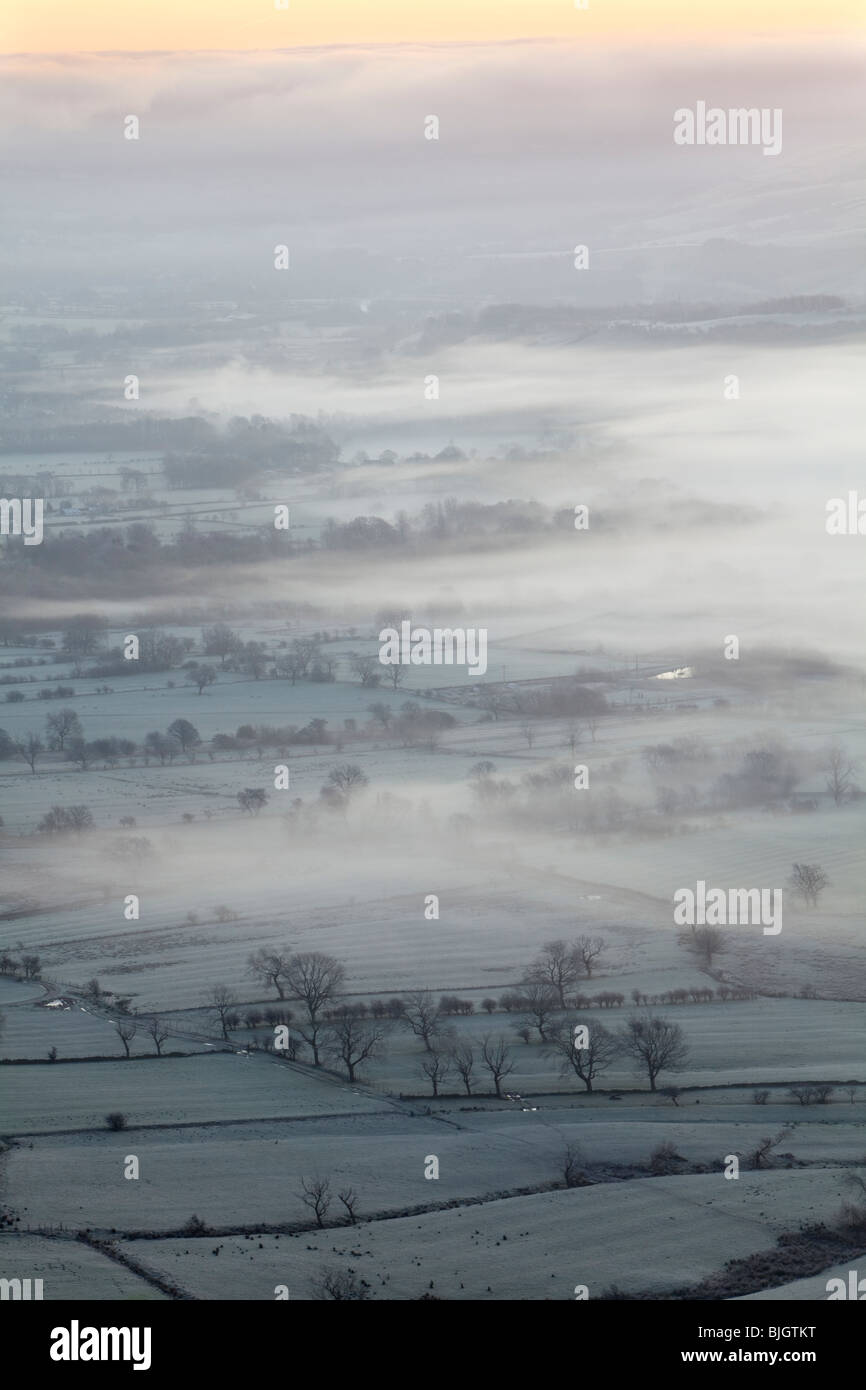 The Hope Valley shrouded in mist at dawn in the Peak District National Park Stock Photo