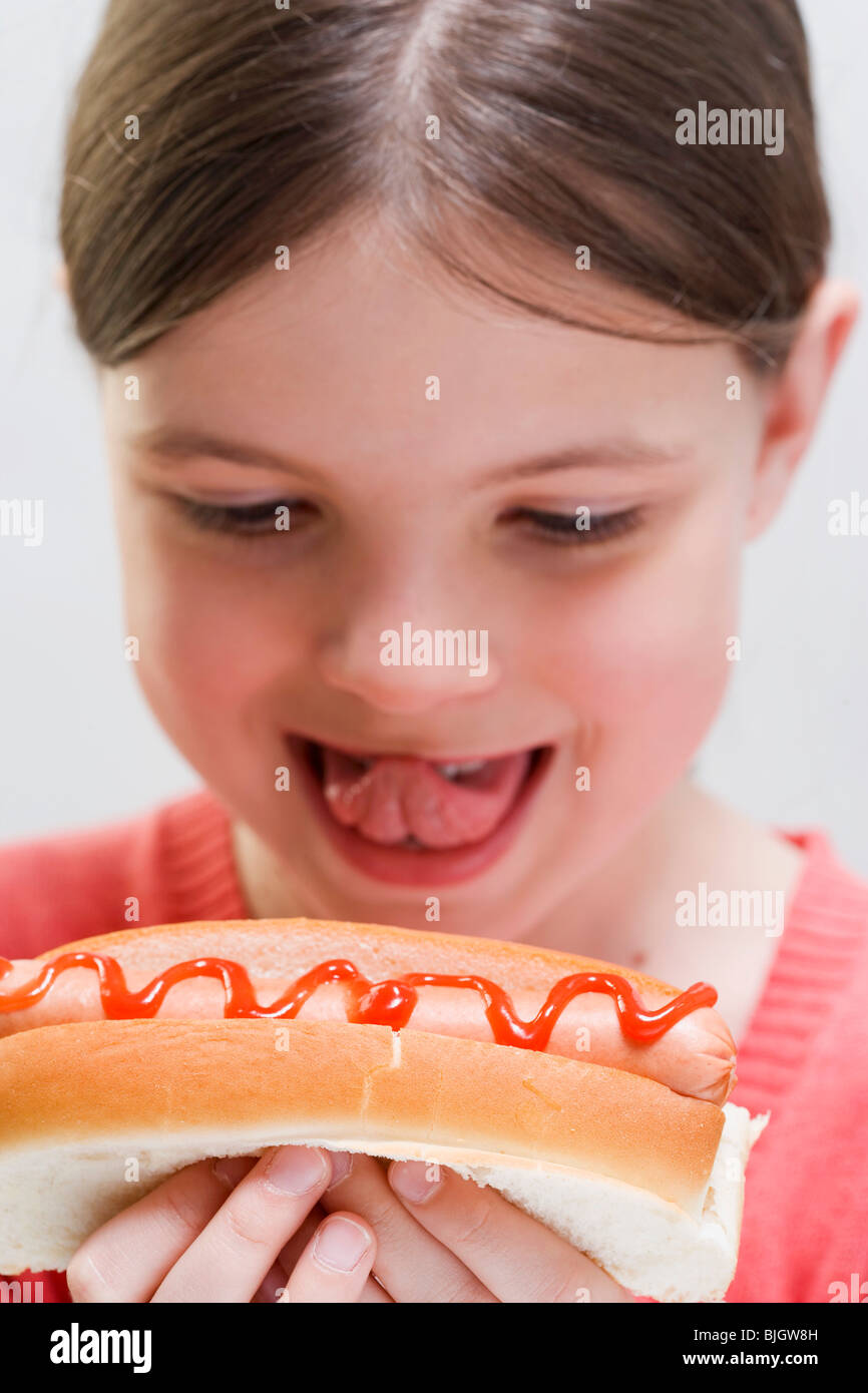 Child with hot dog Stock Photo Alamy